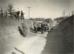 CWA road crew leveling a grade on a county road near Westfield.