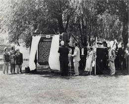 Photograph of a gathering of people at the dedication of the historic marker for Marquette.