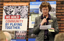 Anita Doering, Archives Manager for the co-host La Crosse Public Library, welcomes guests to the "Share Your Voice" new museum listening session on April 17, 2019.