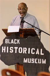 Clayborn Benson, the founder and Executive Director of the Wisconsin Black Historical Society and Museum, welcomes guests to the "Share Your Voice" multicultural session at his organization's facility in Milwaukee.