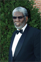 Photograph of Fred Reed wearing a tuxedo