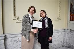 State Historic Preservation Officer Daina Penkiunas presented a certificate to Martha Brown