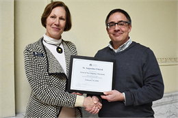 State Historic Preservation Officer Daina Penkiunas presented a certificate to Grant Emmel