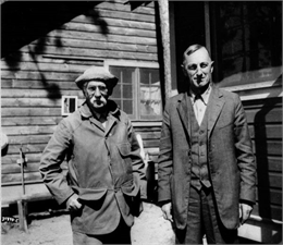 Limnologist Dr. Edward Birge (left) and Professor Chauncey Juday posing together outdoors