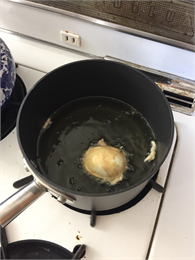 The egg is fried in oil
