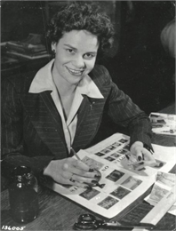 Dorothy Roshak Zmuda at work in the advertising department of Allis-Chalmers. 1944