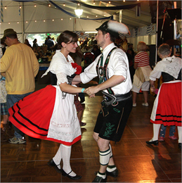 Polka dancers in traditional outfits.
