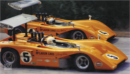 Bruce McLaren, car #4 and Denis Hulme, car #5, led in matching pair of McLaren M8B-Chevrolets during the 1969 Road America Can-Am. McLaren won by a tenth of a second over teammate Hulme, at 1:51:39.
