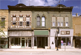 Exterior of commercial main street brick buildings.